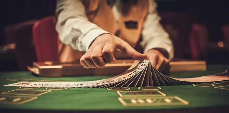 Blackjack table with card games deck